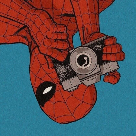 an image of spiderman with a camera hanging upside down